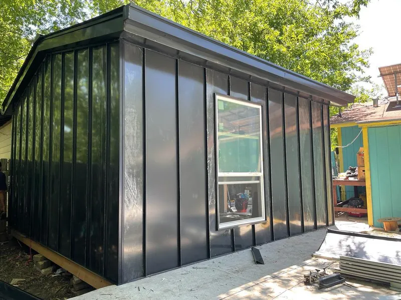 Black standing seam metal wall panels for Metal Roof Installation in Sault Ste. Marie