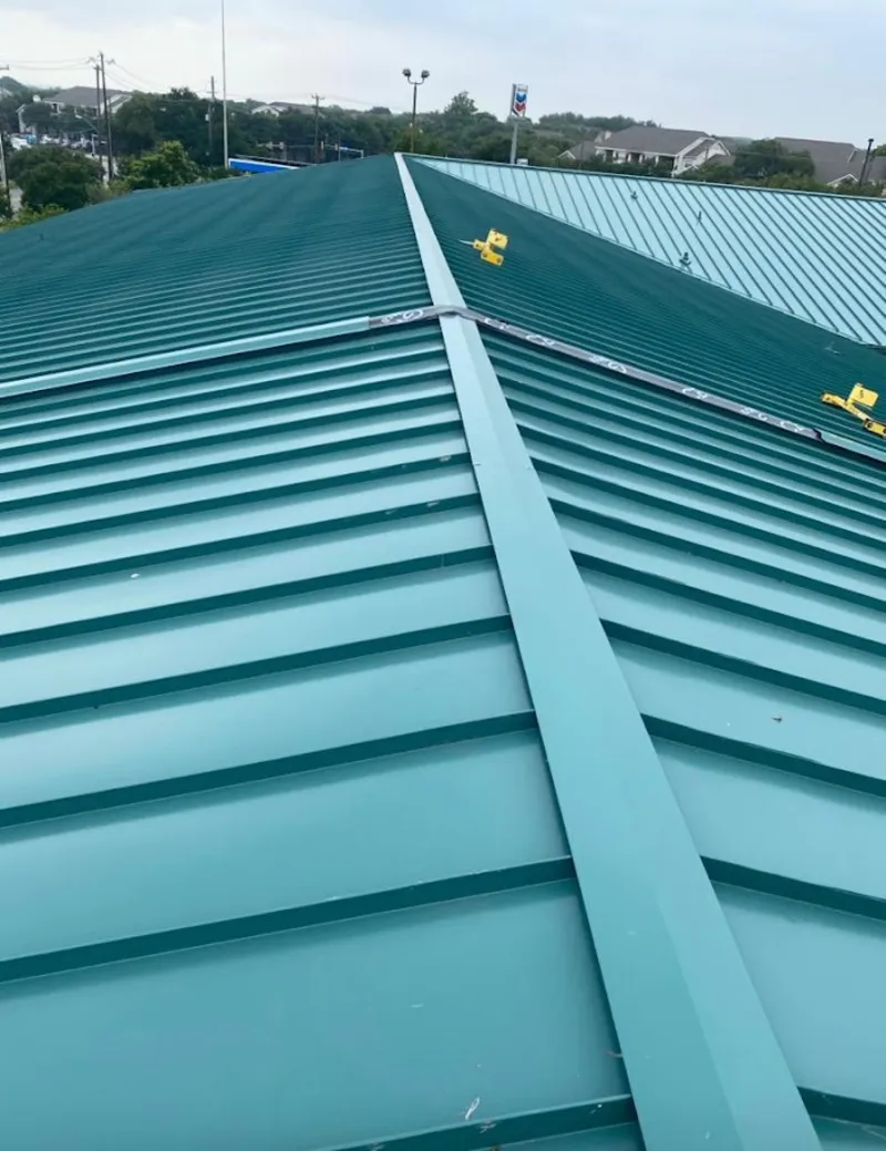 Green commercial metal roof ridge and valley for Metal Roof Repair in Sault Ste. Marie